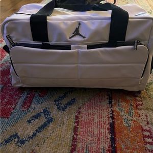 White duffle bag
